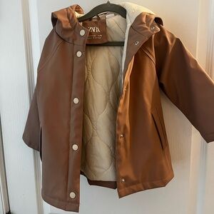 Zara Kids Waterproof Raincoat. Light brown outside and cream lining. Size 2/3